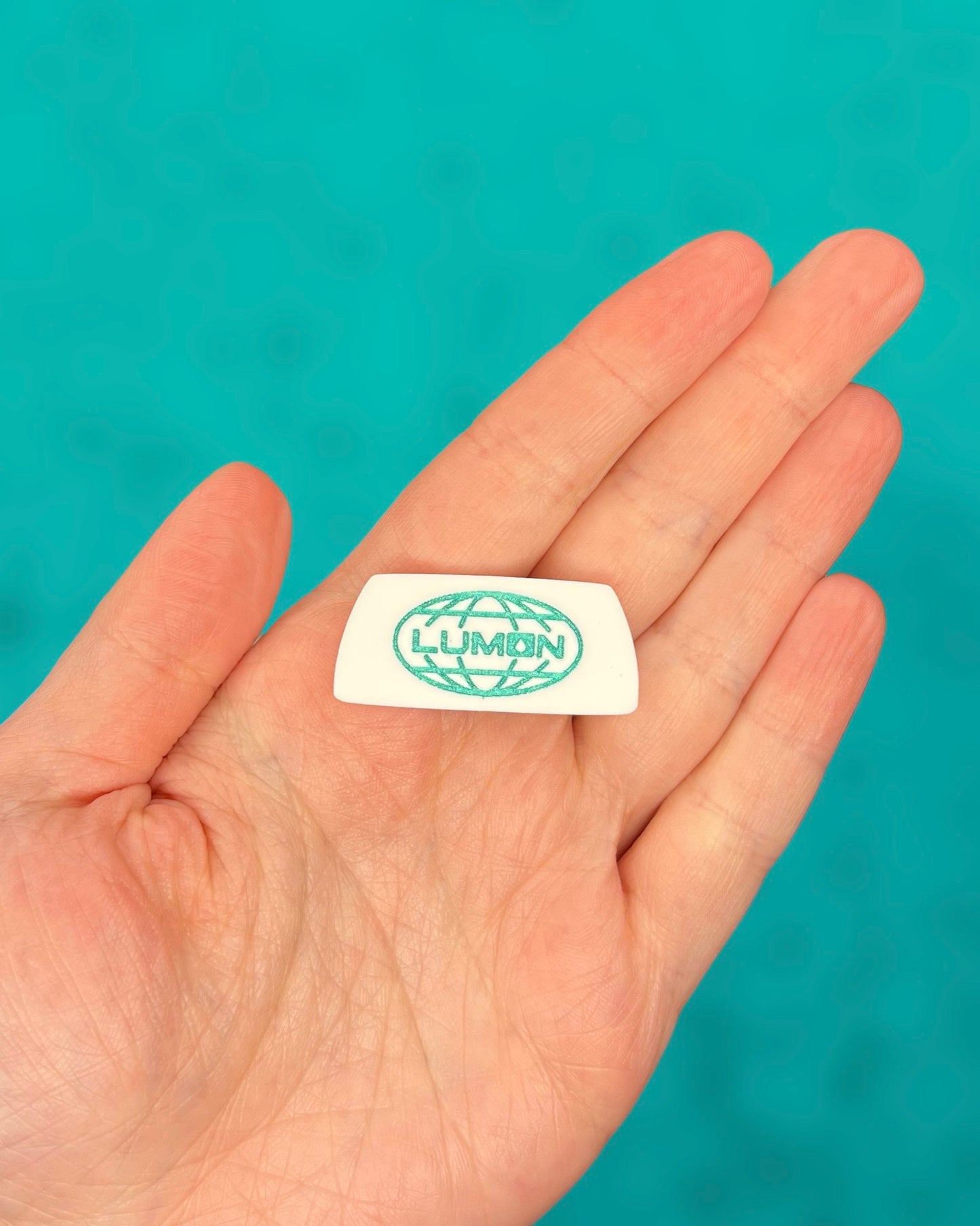 White Lumon Logo Brooch